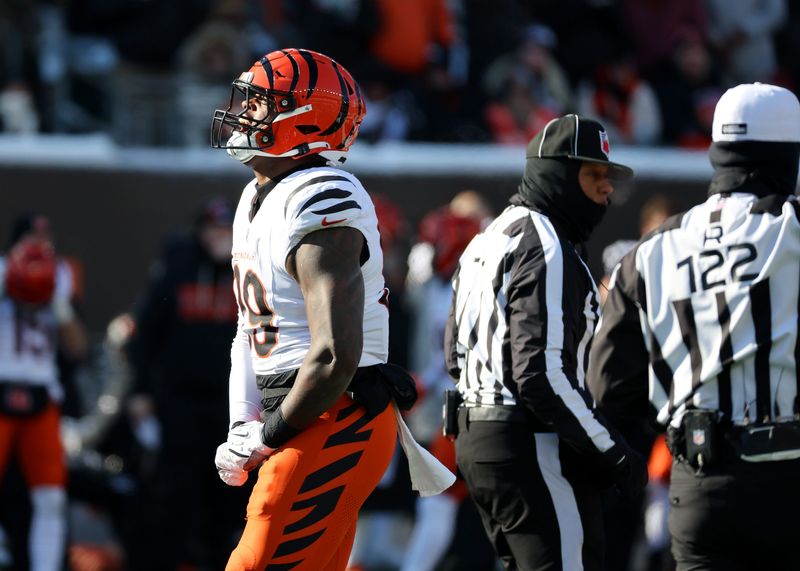 Dec 14, 2025; Cincinnati, Ohio, USA; Cincinnati Bengals defensive end Myles Murphy (99) celebrates his sack during the first quarter against the Baltimore Ravens at Paycor Stadium. Mandatory Credit: Joseph Maiorana-Imagn Images