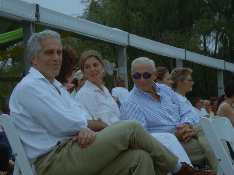 An undated photo of Jeffrey Epstein, an unknown woman, Abigail Wexner, and who appears to be Les Wexner at an event.