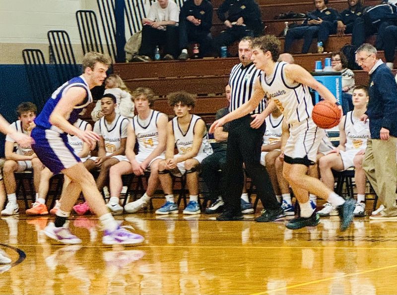 Lancaster senior guard Davis Call looks to dribble past a Logan defender during the Golde Gales' 68-41 Ohio Capital Conference-Buckeye Division Dec. 19, 2025. Call finished with a game-high 21 points.