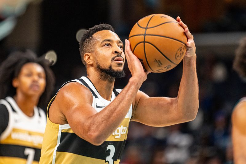 Dec 20, 2025; Memphis, Tennessee, USA; Washington Wizards Guard CJ McCollum (3) shoots a free-throw in the first half against the Memphis Grizzlies at FedExForum. Mandatory Credit: Matthew Smith-Imagn Images