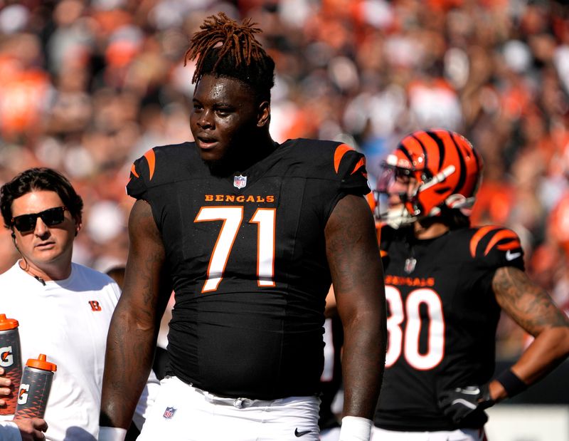 Cincinnati Bengals offensive tackle Amarius Mims (71) during a timeout Paycor Stadium Sunday, November 3, 2024.