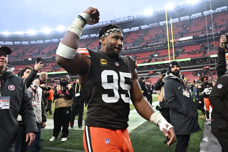 Browns defensive end Myles Garrett exits the field after a win over the Pittsburgh Steelers, Dec. 28, 2025, in Cleveland.