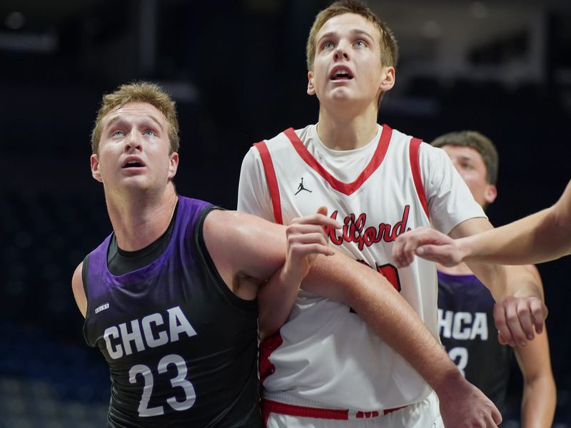 CHCA's Cole Canter (23) boxes out Milford's Brock Shuluga during a game at the Beacon Holiday Hardwood Classic on Dec. 28, 2025.
