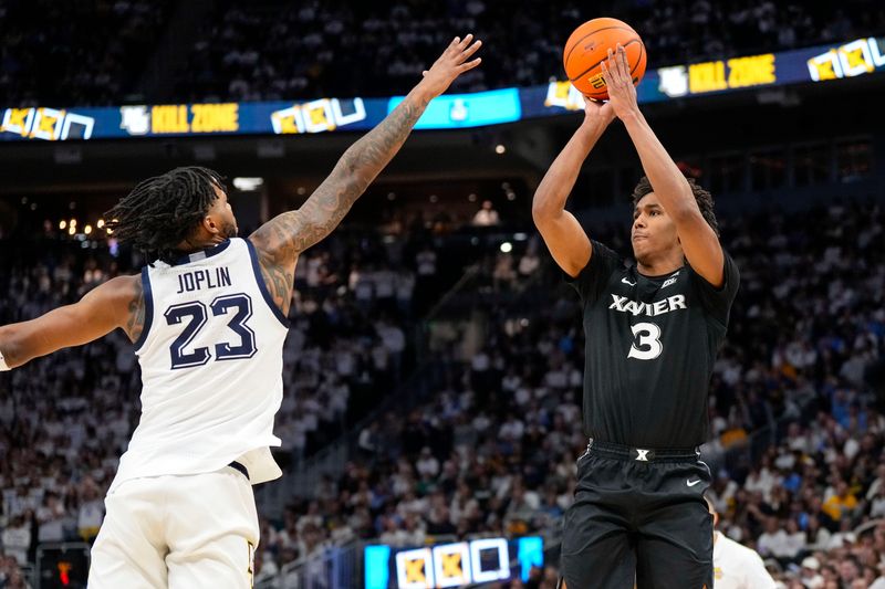 Dailyn Swain (3) helped lead Xavier to an NCAA Tournament appearance in 2025 before transferring to Texas.