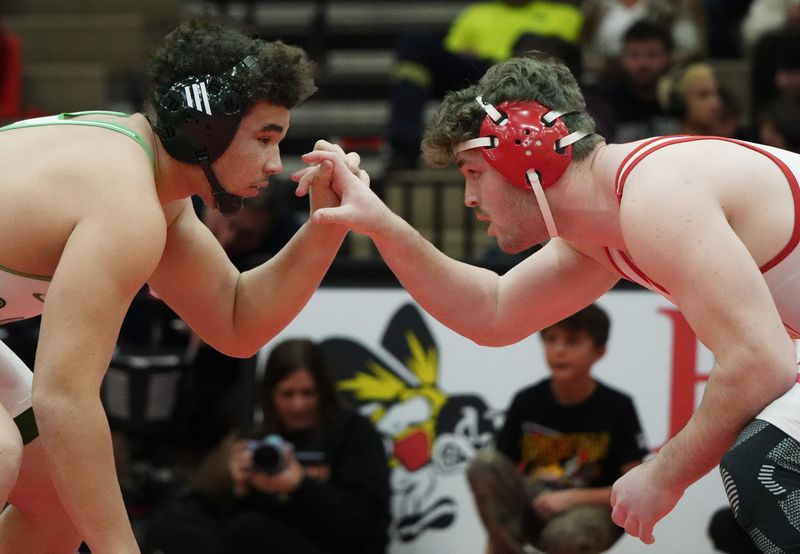 Dublin Coffman’s Braylon Wright takes on Wadsworth’s Jacob Earnest in the 285 pound weight class during the championship round of the Brecksville Invitational Holiday Tournament at Brecksville-Broadview Heights High School on Dec. 30, 2025.