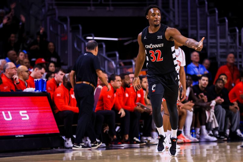 Forward Jalen Celestine celebrates as he heads up court during the Bearcats' Big 12 opener against the Houston Cougars at Fifth Third Arena Jan. 3. UC had a 10-point lead in the second half but couldn't hang on for the win.