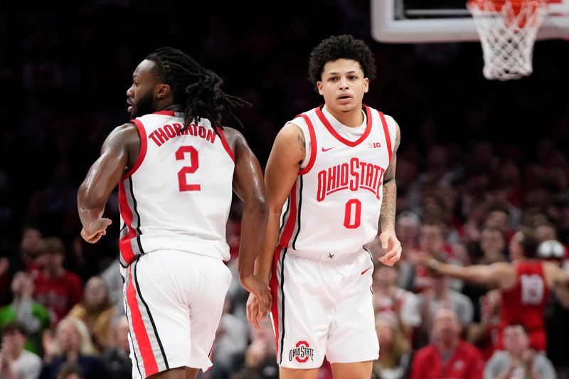 Ohio State guard John Mobley Jr. (0) is expected to return to the Buckeyes next year. Guard Bruce Thornton (2) is out of eligibility and landed an invite to the NBA draft combine.
