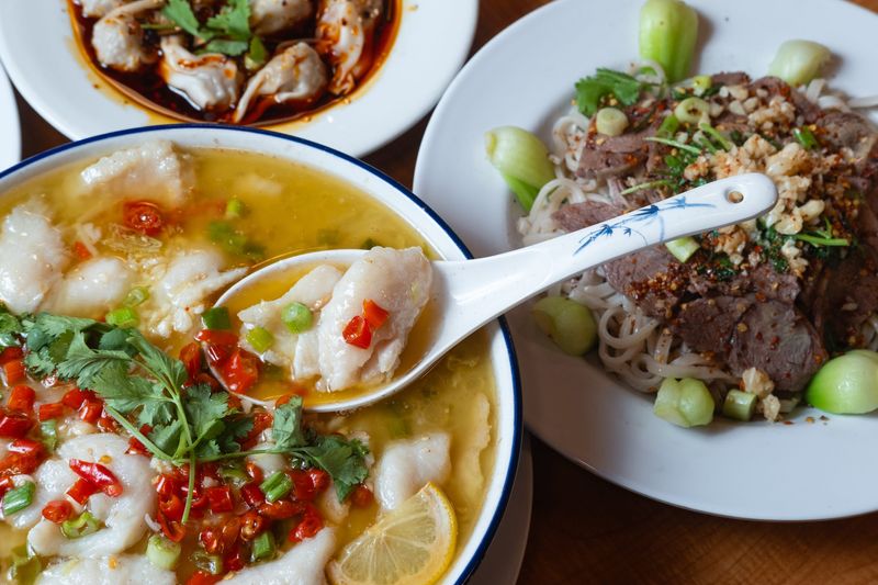 Fish fillets in pickled soup with Sichuan spicy wontons and Beef Stirred Noodles at Fiery Sky Asian Kitchen