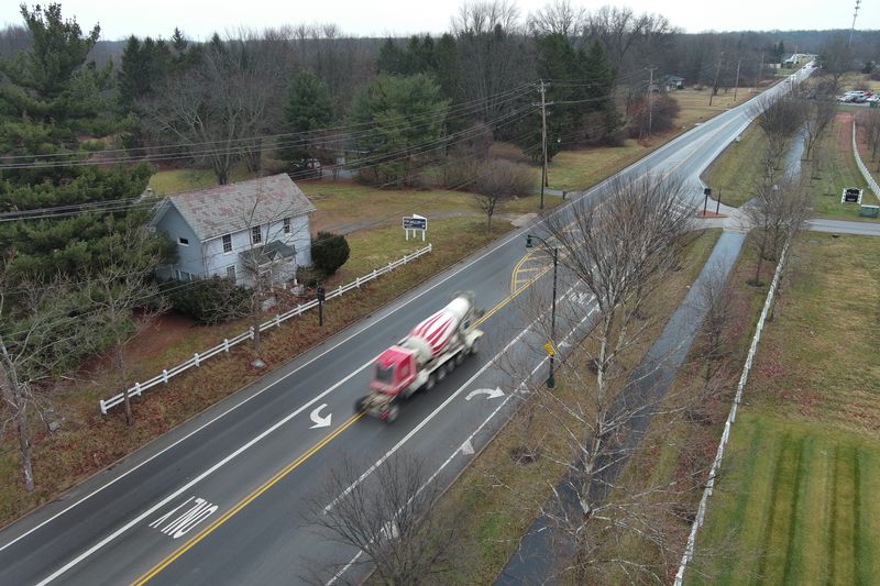 A truck passes by a home for sale on US Rt. 62 just north of St. Rt. 161 Wednesday, January 14, 2026. ODOT is studying the 6.2-mile stretch from Smith’s Mill Road/Walton Parkway in New Albany and Clark Drive at the southwestern edge of Johnstown for potential improvements, including widen, intersection upgrades and pedestrian paths.