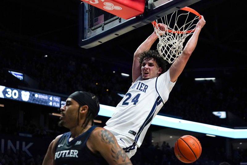 Xavier Musketeers forward Jovan Milicevic (24) dunks the ball in the first half of a NCAA men’s basketball game between the Xavier Musketeers and the Butler Bulldogs, Wednesday, Jan. 14, 2026, at Cintas Center in Cincinnati.