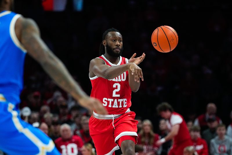 Ohio State Buckeyes guard Bruce Thornton (2) passes the ball against the UCLA Bruins in the first half at Value City Arena on Saturday, Jan. 17, 2026 in Columbus, Ohio.