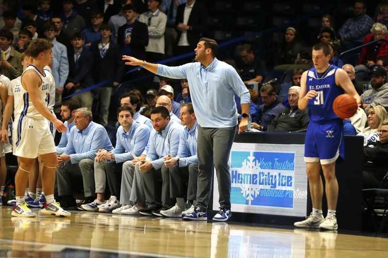 Covington  Catholic head coach Jake Thelen, shown earlier this season, became the fastest coach in school history to reach 50 victories when the Colonels beat Moeller Feb. 17.