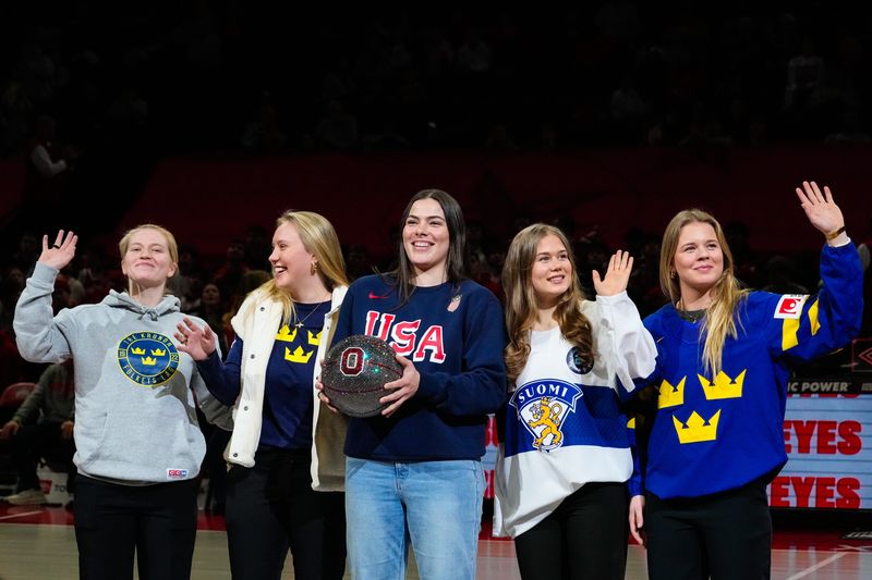 Ohio State women’s hockey players to represent their countries in the olympics (from left to right) Hilda Svensson, Jenna Raunio, Joy Dunne, Sanni Vanhanen and Mira Jungåker are honored during the Buckeyes men’s basketball game at Value City Arena on Tuesday, Jan. 20, 2026 in Columbus, Ohio.