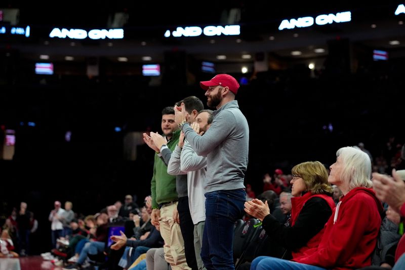 Ohio State Buckeye fans celebrate in the second half of the NCAA basketball game at Value City Arena on Tuesday, Jan. 20, 2026 in Columbus, Ohio.