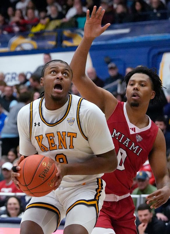 Kent State’s Morgan Safford looks to shoot as Miami’s Eian Elmer defends during the game at the MAC Center in Kent on Jan. 20, 2026.