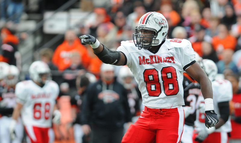 Canton McKinley defensive end Steve Miller reacts after making a play at Massillon.