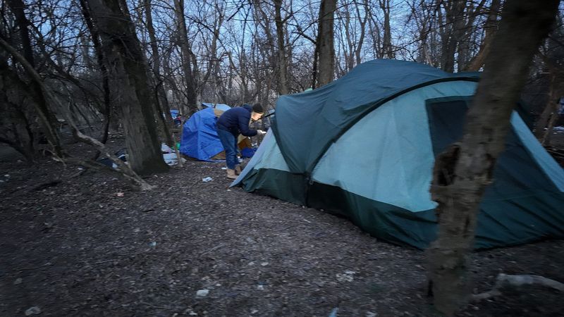 Sam Masters asks a homeless person questions as volunteers and staff members from more than 15 organizations assisted the Community Shelter Board in their “Point-In-Time Count” of homeless people in Columbus and Franklin County on Thursday, Jan 22, 2026.