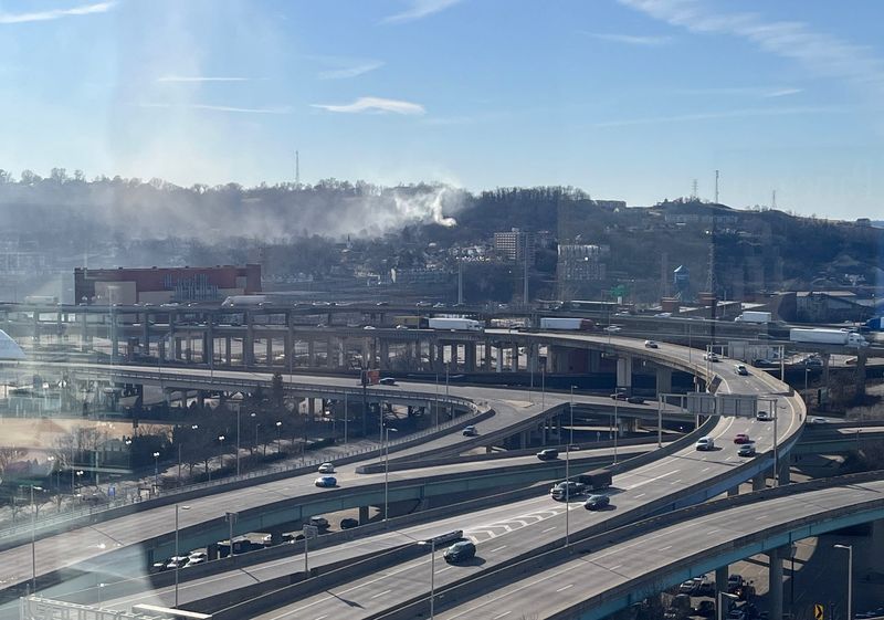 A plume of smoke is seen coming from a house fire in Covington, Kentucky, on Jan. 22, 2026.