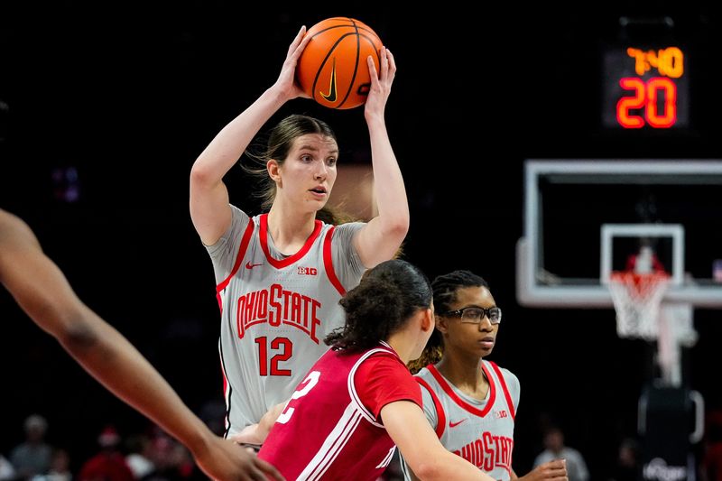 Ohio State Buckeyes center Elsa Lemmilä (12) looks to pass the ball in the second half of the NCAA basketball game at Value City Arena on Thursday, Jan. 22, 2026 in Columbus, Ohio.
