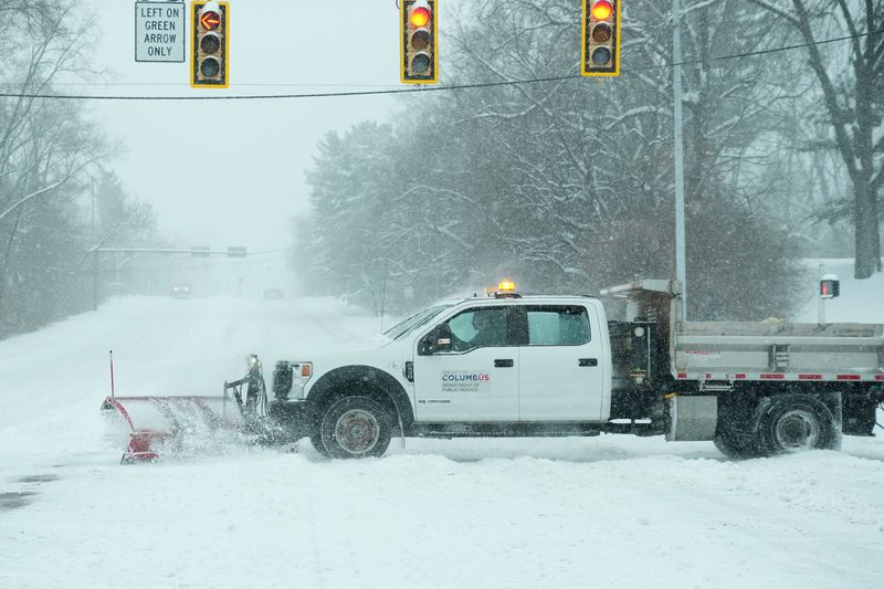 A City of Columbus truck clears snow as Winter Storm Fern continues to dump snow on the Central Ohio area on Jan. 25, 2026.
