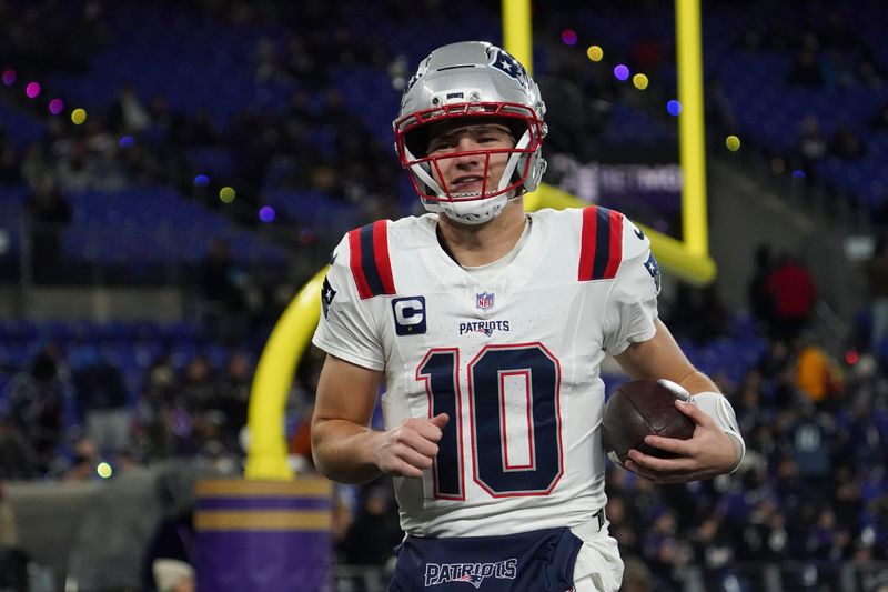 New England Patriots quarterback Drake Maye (10) warms up prior to the game against the Baltimore Ravens at M&T Bank Stadium in Baltimore, Maryland on Dec. 21, 2025.