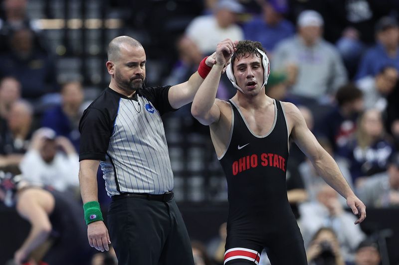 Mar 21, 2025; Philadelphia, PA, USA; Jesse Mendez of Ohio State defeats Vance Vombaur of Minnesota (no pictured) during day two of the NCAA Wrestling Championships at Wells Fargo Center. Mandatory Credit: Bill Streicher-Imagn Images