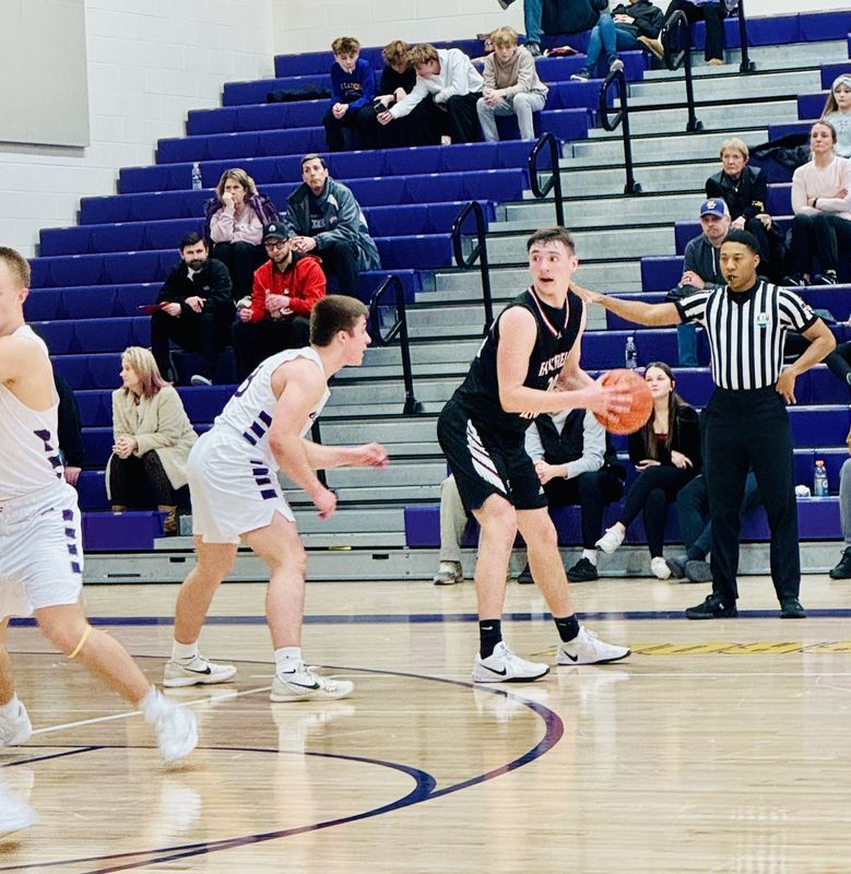 Fairfield Union's Keaton Webb looks to pass the ball to a teammate against Bloom-Carroll Feb. 2, 2025. Webb finished with 16 points and 11 rebounds in the Falcons' 54-44 victory.