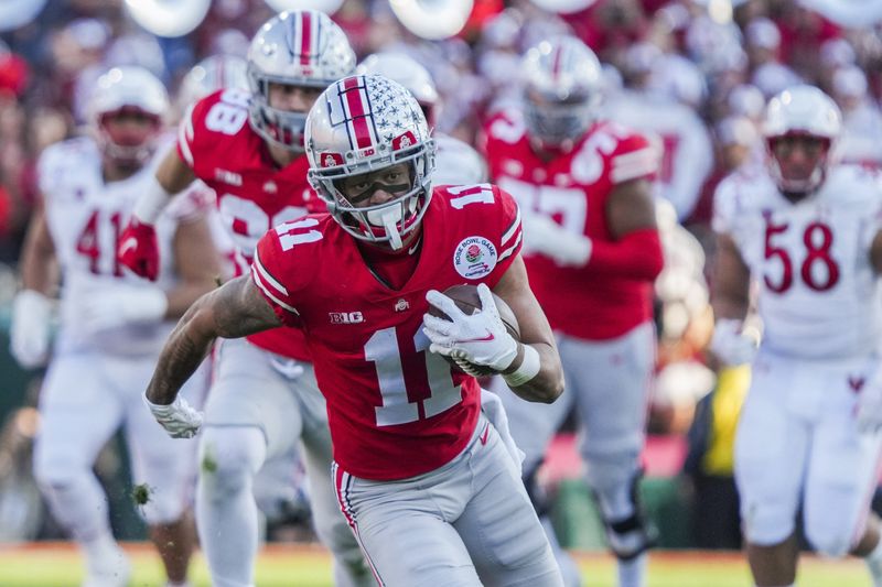 Ohio State receiver Jaxon Smith-Njigba set an FBS bowl record with 347 receiving yards in the Rose Bowl as part of a 48-45 win over Utah.