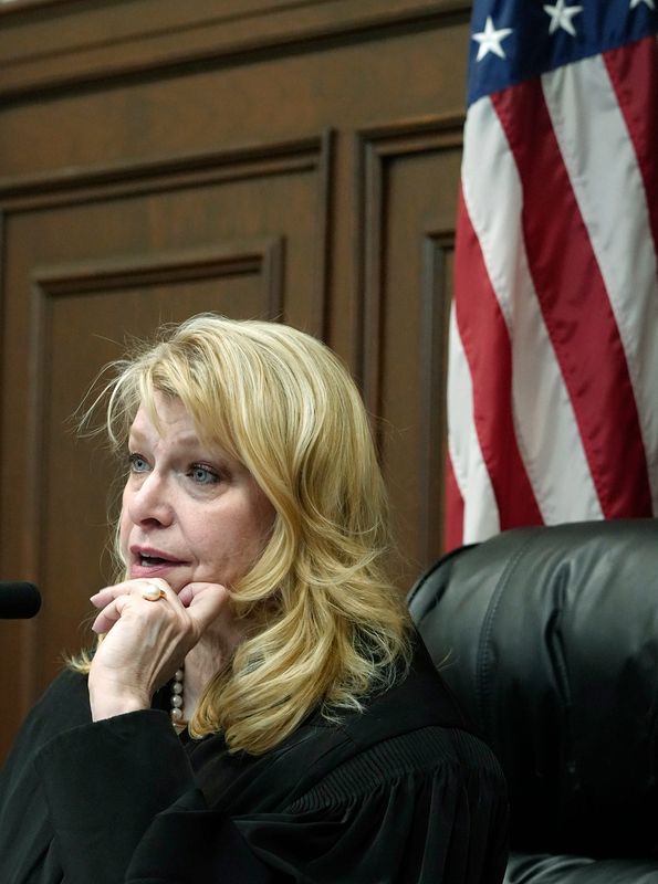 Summit County Common Pleas Judge Kelly McLaughlin asks the prosecutor about a plea deal during a plea hearing in her court. McLaughlin is facing a challenge in the May primary after the Summit County Democratic Party pulled its endorsement.