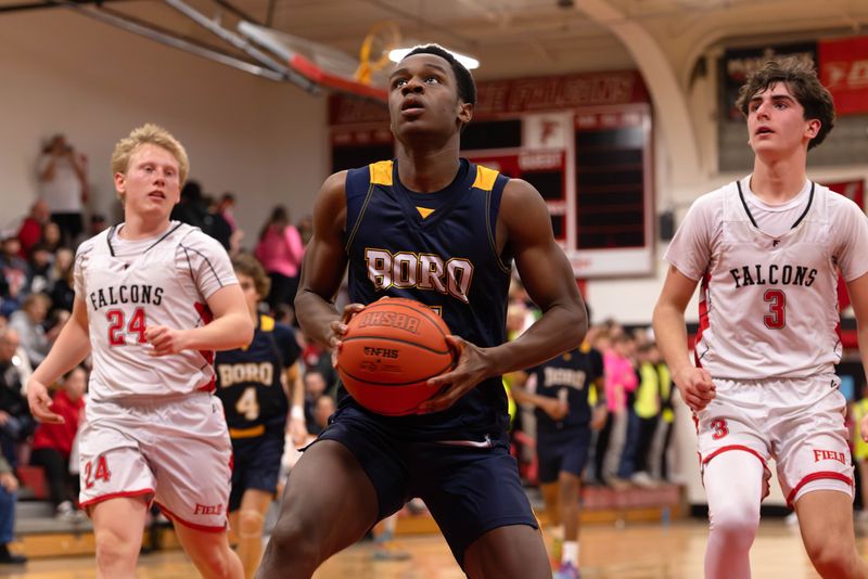 Streetsboro's Ethan Laryea drives to the basket during a basketball game against Field High School on Friday, February 6, 2026 in Brimfield Township, OH.