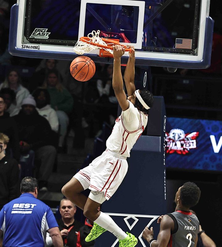 Lakota West's Joshua Tyson (2) dunks during their 58-53 win over Princeton at Cintas Center, Friday, Feb. 6, 2026.