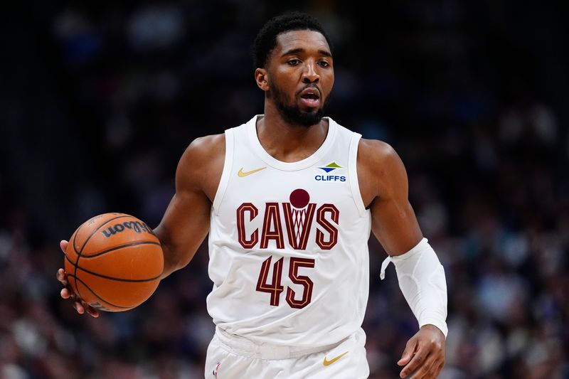 Feb 9, 2026; Denver, Colorado, USA; Cleveland Cavaliers guard Donovan Mitchell (45) during the second quarter against the Denver Nuggets at Ball Arena. Mandatory Credit: Ron Chenoy-Imagn Images
