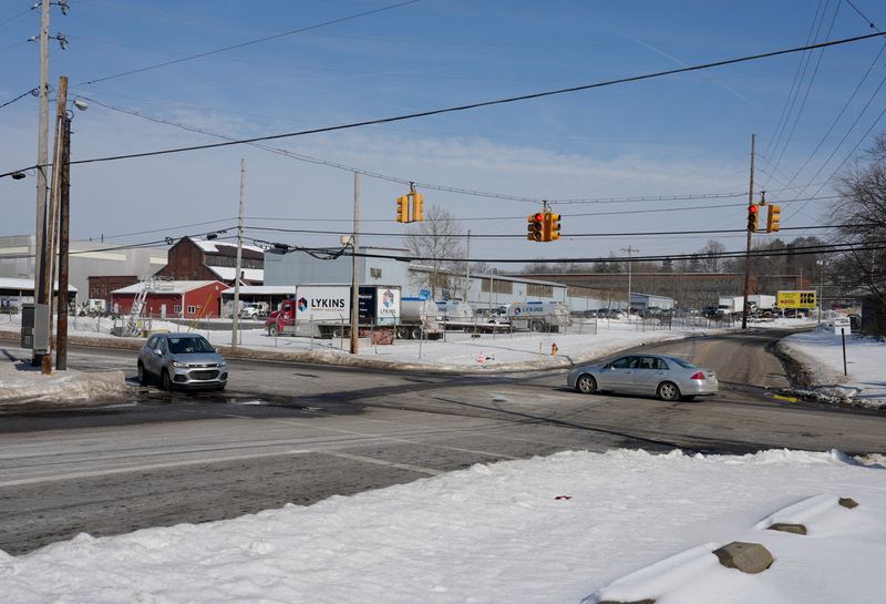 Vehicles travel through the Erie Street S and Walnut Road SE intersection in Massillon. The city's proposed road repaving plan aims to upgrade sections of nearly three-dozen streets in 2026. Part of Erie Street is on this year's list.