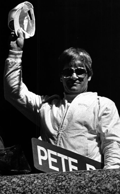Cincinnati Reds player-manager Pete Rose waves his cap to a crowd of 7,000 that flocked to Fountain Square Sept. 13, 1985, to honor him for breaking Ty Cobb's Major League hits record. Mayor Charles Luken presented Rose with a Pete Rose Way sign, commemorating the renaming of Second Street.