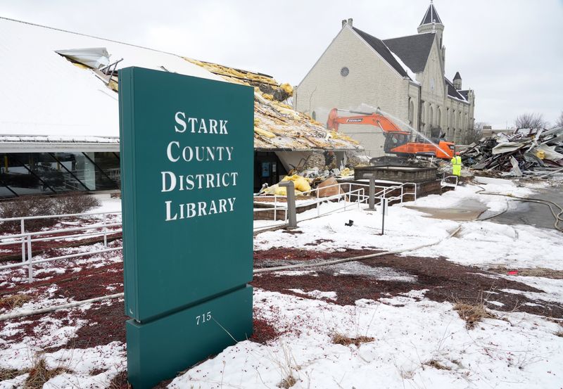 Crews demolish the Stark Library's main branch in downtown Canton to make way for a new library, which is expected to be compete in 2028.