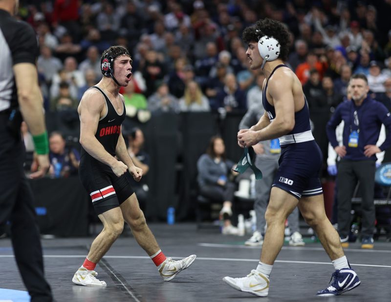 Mar 21, 2025; Philadelphia, PA, USA; Jesse Mendez of Ohio State defeats No. 2 Beau Bartlett Penn State in the semifinals of the NCAA Wrestling Championships at Wells Fargo Center. Mandatory Credit: Bill Streicher-Imagn Images