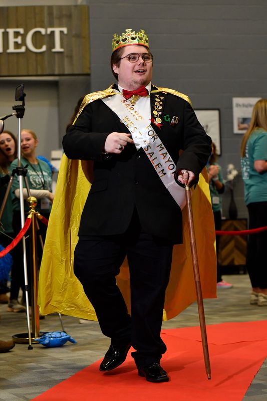 Gabe Sarno walks down the red carpet at "Night to Shine" hosted by Grace Brethren Church.