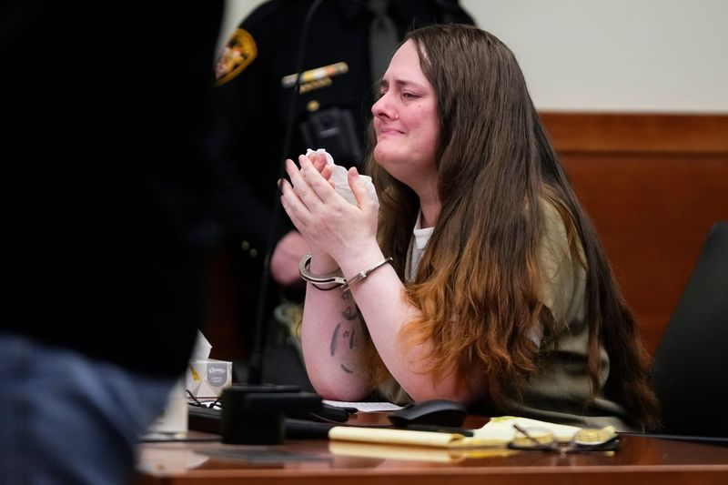 Rebecca Auborn listens to victim statements before being sentenced to 60 years to life in prison on four counts of murder and one count of felonious assault by Franklin County Common Pleas Court Judge Karen Phipps on Feb. 19, 2026.
