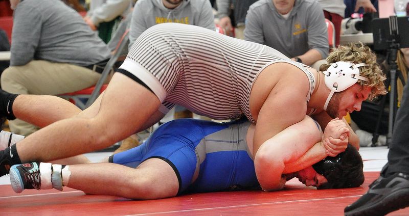 Brandon Walters of Waynedale with a pin over Maddix May of Northwestern in the 285 pound match.