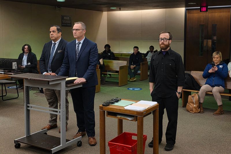 Ohio State University professor Luke Perez, left, appeared in court for his arraignment on Feb. 23 after he was charged with assaulting Mike Newman, right, a filmmaker and independent journalist on the OSU campus on Feb. 9.