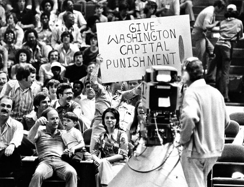 A fan holds a sign at the Richfield Coliseum as the Cavaliers hosted Washington in a playoff series on April 17, 1976.