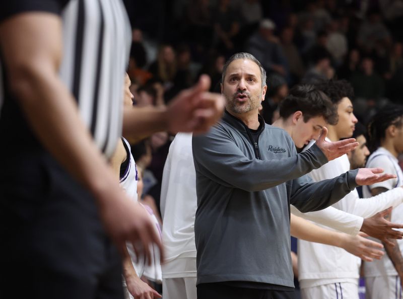 Mount Union coach Mike Fuline has words with an official in the second half of their game against Heidelberg in an Ohio Athletic Conference Tournament semifinal, Feb. 26, 2026.