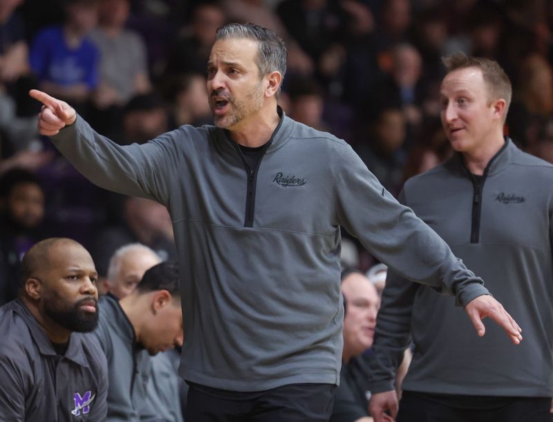 Josh Twiddy (right) will take over for Mike Fuline as Mount Union men's basketball head coach.