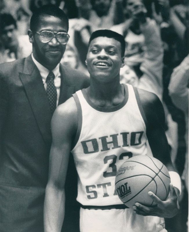 Coach Herb Williams stands behind Dennis Hopson after congratulating OSU's new career leading scorer on March 4, 1987.
