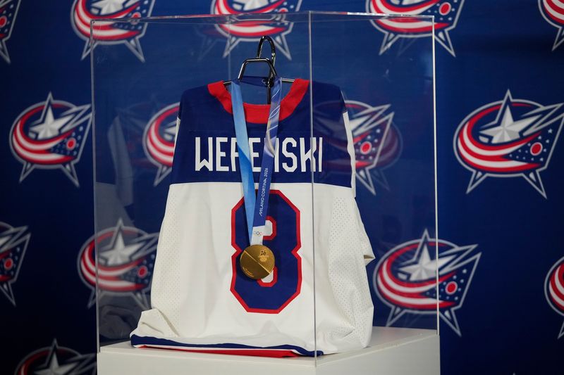 Columbus Blue Jackets defenseman Zach Werenski's Team USA Olympic gold medal is on display prior to the NHL hockey game against the New York Islanders at Nationwide Arena in Columbus on Feb. 28, 2026.