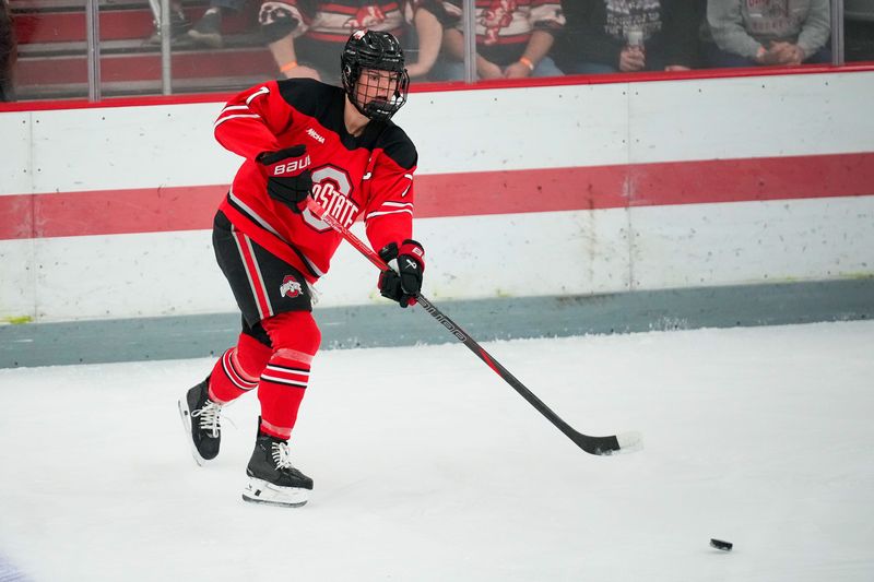 Ohio State Buckeyes defenseman Emma Peschel (7) passes the puck in the first period during the first round of the WCHA at OSU Ice Rink on Saturday, Feb. 28, 2026 in Columbus, Ohio.