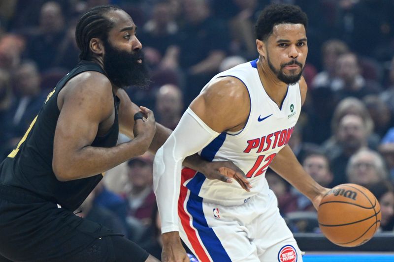 Mar 3, 2026; Cleveland, Ohio, USA; Cleveland Cavaliers guard James Harden (1) defends Detroit Pistons forward Tobias Harris (12) in the first quarter at Rocket Arena. Mandatory Credit: David Richard-Imagn Images