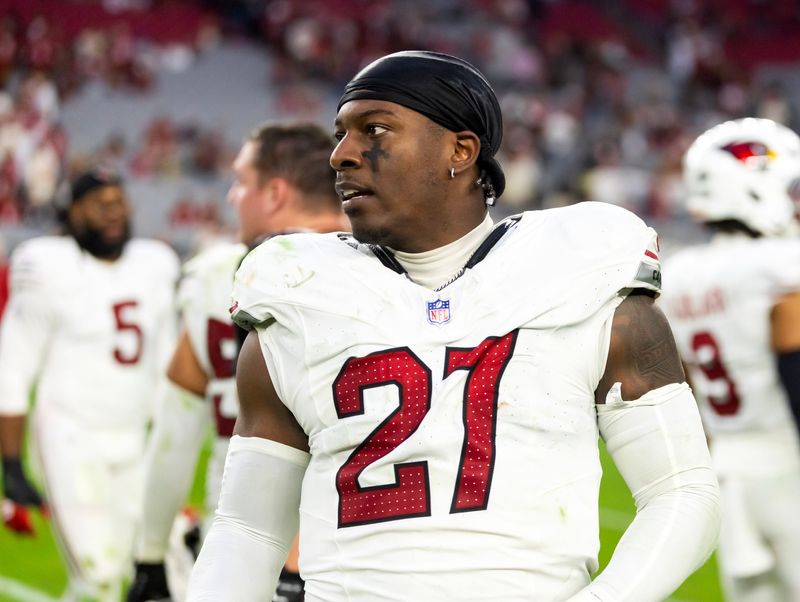 Dec 21, 2025; Glendale, Arizona, USA; Arizona Cardinals linebacker Akeem Davis-Gaither (27) against the Atlanta Falcons at State Farm Stadium. Mandatory Credit: Mark J. Rebilas-Imagn Images