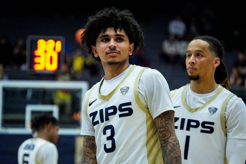 Akron Zips’ Sharron Young (3) looks to the baseline audience during a Mid American Conference men’s basketball game against NIU, March 6, 2026, at James A Rhodes Arena in Akron, Ohio.