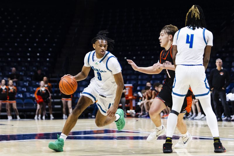 Isaiah Mack-Russell (0) of the Winton Woods Warriors dribbles toward the basket  in the OHSAA DII District Finals vs. Anderson on March 6 at Xavier's Cintas Center.